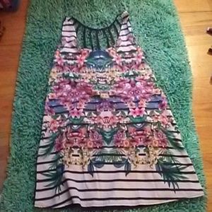 Flower covered white and black bathing suit cover